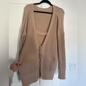 Long sweater or sweater dress with open lace up back